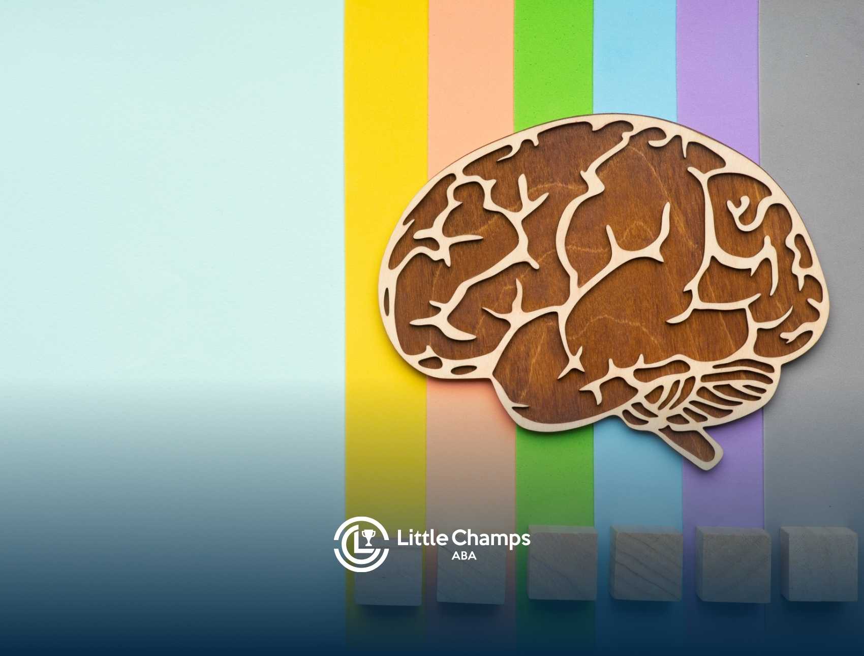 Wooden brain cutout on a vibrant striped background with yellow, orange, green, blue, and purple.