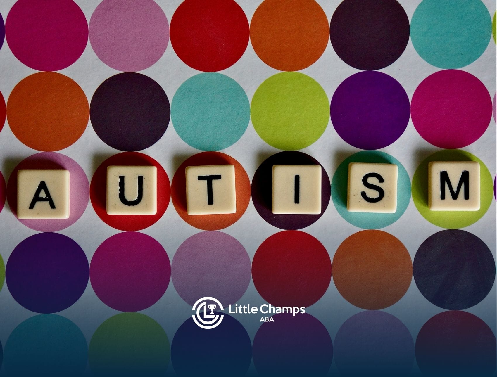 Six tiles spelling "AUTISM" on a colorful polka dot, signifying autism statistics in Colorado.