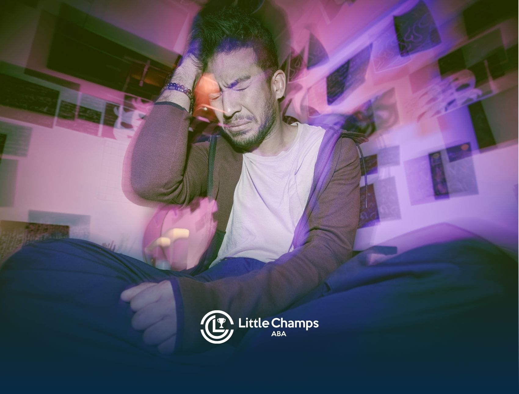 A man look struggling, holding his head.