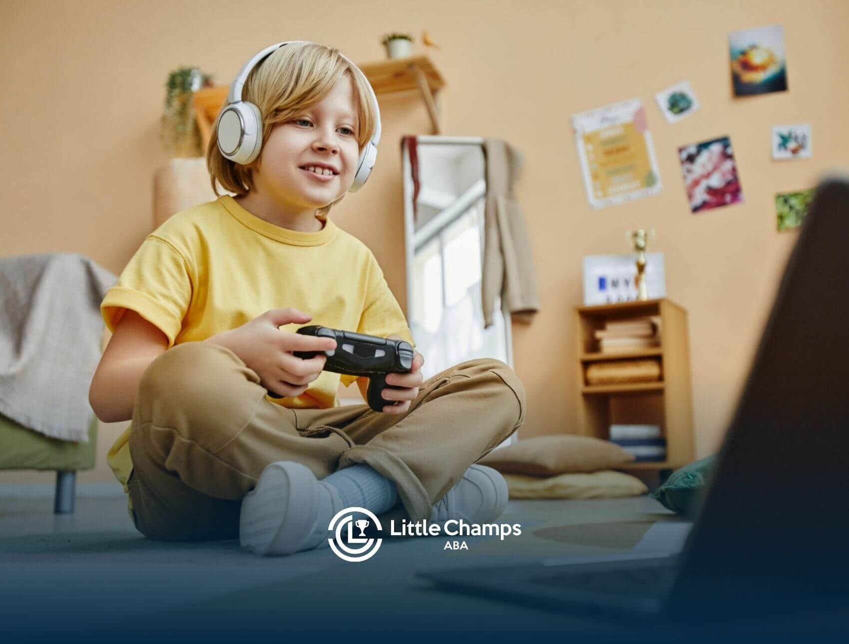 Boy with autism playing Minecraft on laptop.