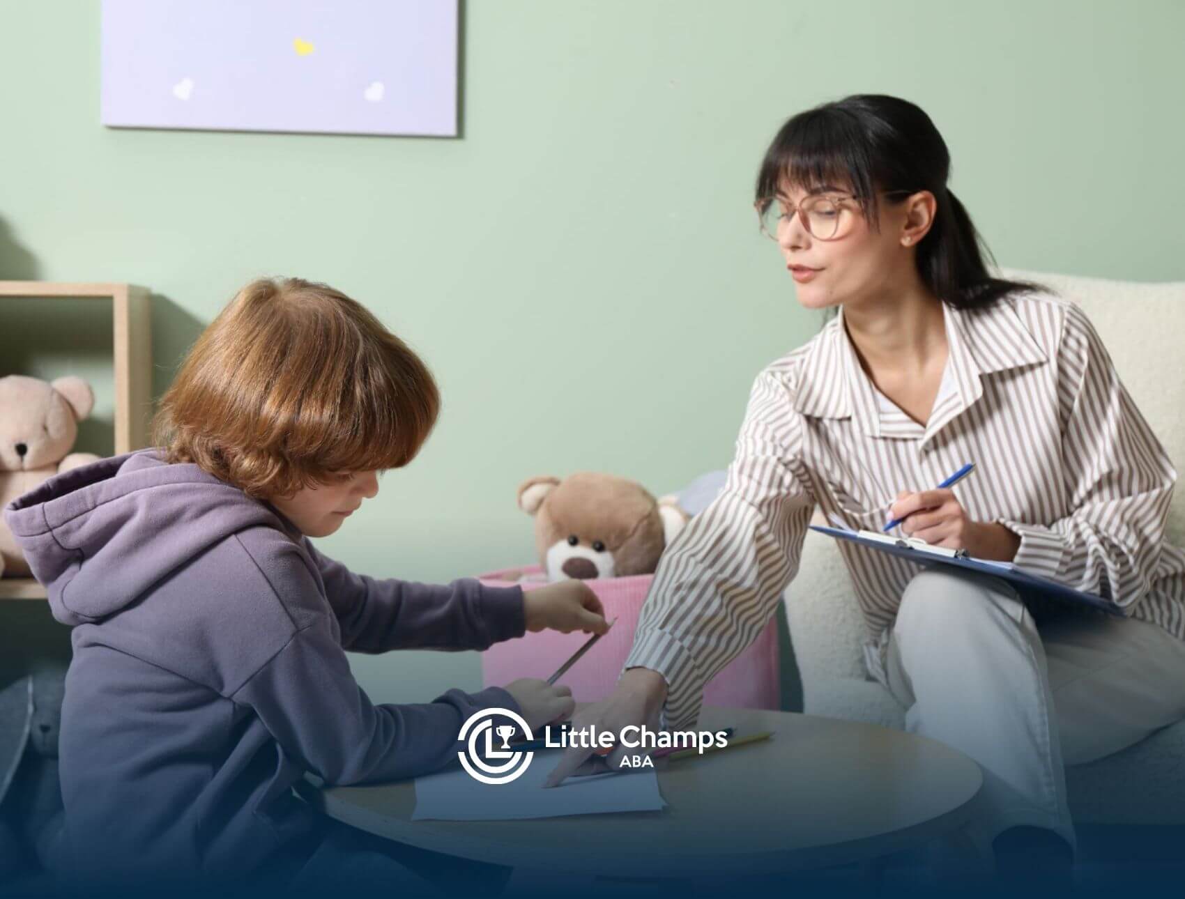 ABA therapist working with child during ABA therapy session.